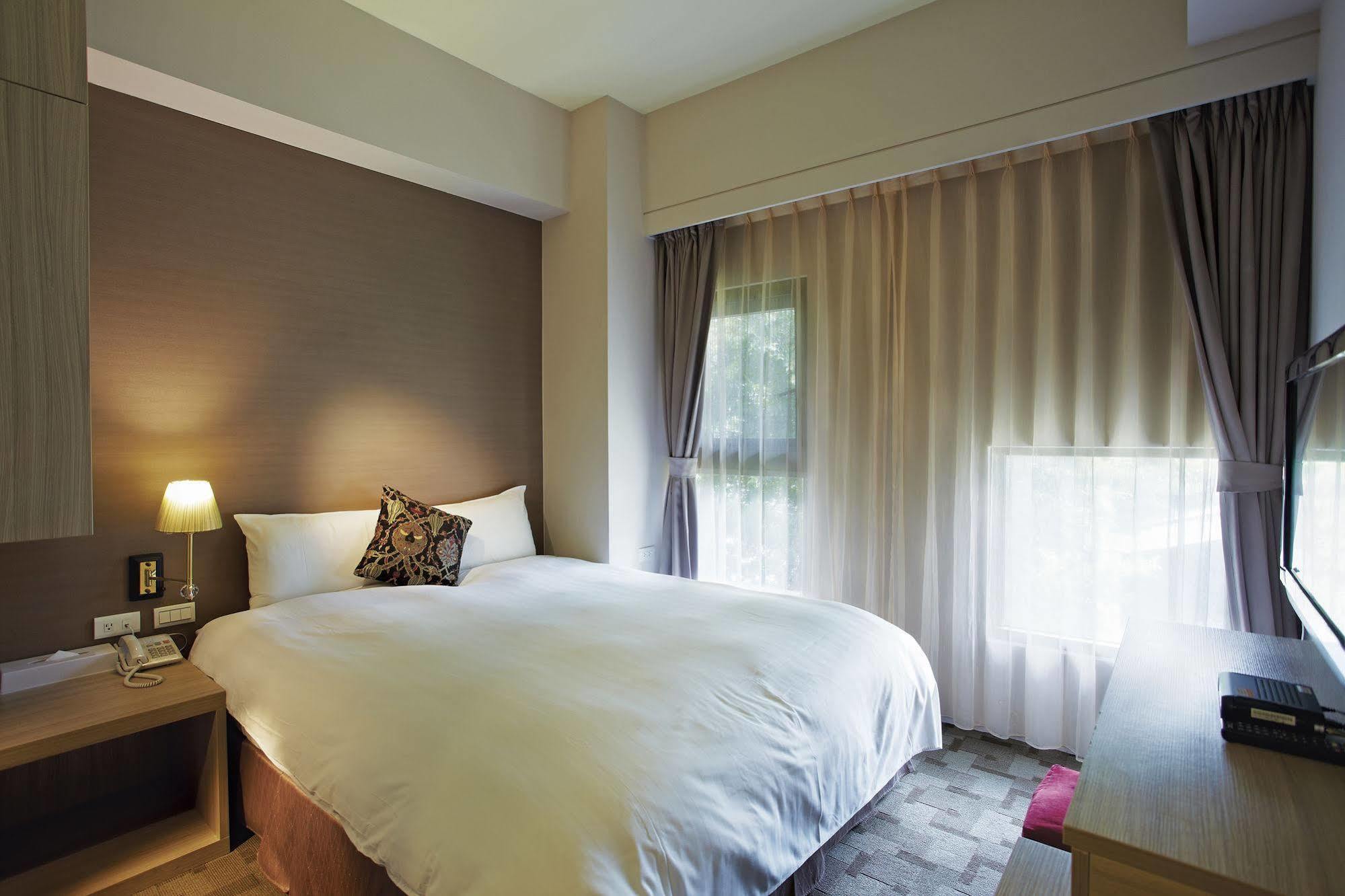 Micasa Hotel Тайчжун Экстерьер фото